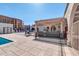 Outdoor kitchen with grill and seating area at 7940 E Camelback Rd # 506, Scottsdale, AZ 85251