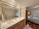 Double sink bathroom with large mirror at 8013 N Via Palma St, Scottsdale, AZ 85258