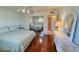 Bright bedroom with mirrored closet and wood floors at 8013 N Via Palma St, Scottsdale, AZ 85258