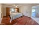 Bright bedroom with hardwood floors and ensuite bath at 8013 N Via Palma St, Scottsdale, AZ 85258