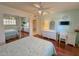 Bedroom with hardwood floors and built-in mirrored closet at 8013 N Via Palma St, Scottsdale, AZ 85258