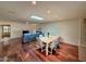 Dining area with hardwood floors and a table for four at 8013 N Via Palma St, Scottsdale, AZ 85258