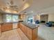 Open kitchen with granite counters and living room view at 8013 N Via Palma St, Scottsdale, AZ 85258