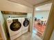 Laundry room with washer, dryer, and access to dining room at 8013 N Via Palma St, Scottsdale, AZ 85258