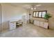 Home office with built-in shelving and tile floor at 8013 N Via Palma St, Scottsdale, AZ 85258