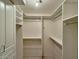 Large walk-in closet with shelving and rods at 8013 N Via Palma St, Scottsdale, AZ 85258