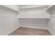 Large walk-in closet with double hanging rods at 815 S 151St Ln, Goodyear, AZ 85338