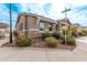 Single-story home with stone accents and landscaping at 815 S 151St Ln, Goodyear, AZ 85338