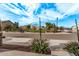 Residential street view with manicured lawns and homes at 815 S 151St Ln, Goodyear, AZ 85338