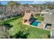 Aerial view of house, pool, and expansive backyard at 8220 N 15Th Ave, Phoenix, AZ 85021