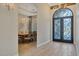 Bright entryway with hardwood floors and formal dining area at 8220 N 15Th Ave, Phoenix, AZ 85021