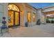 Ornate double doors and welcoming entry to the home at 8220 N 15Th Ave, Phoenix, AZ 85021