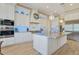 Gourmet kitchen with white cabinets, granite counters, and high-end appliances at 8220 N 15Th Ave, Phoenix, AZ 85021