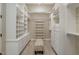 Large walk-in closet with ample shelving and drawers at 8220 N 15Th Ave, Phoenix, AZ 85021