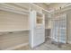 Spacious walk-in closet with shelves, drawers, and ladder at 8220 N 15Th Ave, Phoenix, AZ 85021