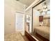 Bedroom with mirrored closet and view into bathroom at 840 S Aquamarine Dr, Apache Junction, AZ 85119