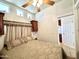 Bedroom with mirrored closet and access to bathroom at 840 S Aquamarine Dr, Apache Junction, AZ 85119