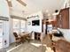 Dining area with wood table and chairs near kitchen at 840 S Aquamarine Dr, Apache Junction, AZ 85119