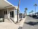 Mobile home exterior with covered patio and street view at 840 S Aquamarine Dr, Apache Junction, AZ 85119