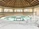 Relaxing hot tub area with covered seating at 840 S Aquamarine Dr, Apache Junction, AZ 85119