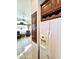 Kitchen area with stainless steel refrigerator and wood cabinets at 840 S Aquamarine Dr, Apache Junction, AZ 85119