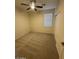 Spacious bedroom with ceiling fan and double door closet at 8498 W Maya Dr, Peoria, AZ 85383