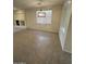 Spacious dining area with tile flooring and a large window at 8498 W Maya Dr, Peoria, AZ 85383