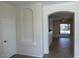 Entryway view into the living room area, showing an open layout at 8498 W Maya Dr, Peoria, AZ 85383