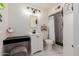 Updated bathroom with marble shower and vanity at 936 E 8Th Pl, Mesa, AZ 85203