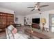 Bright and airy living room with mid-century furniture and a warm color scheme at 936 E 8Th Pl, Mesa, AZ 85203