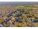 Aerial view showcasing home's location in a desirable neighborhood with golf course views at 10756 E Ludlow Dr, Scottsdale, AZ 85255