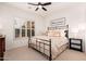 Spacious bedroom with king-size bed and plenty of natural light at 10756 E Ludlow Dr, Scottsdale, AZ 85255