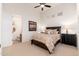 Cozy bedroom with queen-size bed and en-suite bathroom at 10756 E Ludlow Dr, Scottsdale, AZ 85255