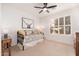 Charming bedroom with daybed and natural light at 10756 E Ludlow Dr, Scottsdale, AZ 85255