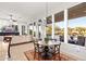 Bright kitchen features an island, breakfast nook, and views of the backyard at 10756 E Ludlow Dr, Scottsdale, AZ 85255