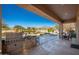 Outdoor kitchen and patio with mountain views at 10756 E Ludlow Dr, Scottsdale, AZ 85255