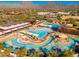 Resort-style community pool complex with multiple pools and a waterslide at 10756 E Ludlow Dr, Scottsdale, AZ 85255