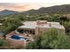 Modern home with pool and mountain views at 10758 E Tamarisk Way, Scottsdale, AZ 85262