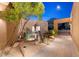 Relaxing courtyard with desert landscaping and fountain at 10758 E Tamarisk Way, Scottsdale, AZ 85262