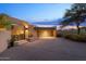 Contemporary home with stucco exterior and private driveway at 10758 E Tamarisk Way, Scottsdale, AZ 85262