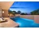 Luxury pool and spa with tiled deck at 10758 E Tamarisk Way, Scottsdale, AZ 85262