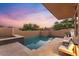 Inviting pool and spa with a tiled deck and lounge chairs at 10758 E Tamarisk Way, Scottsdale, AZ 85262