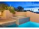 Elevated spa with blue tile and desert landscaping at 10758 E Tamarisk Way, Scottsdale, AZ 85262