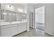 Modern bathroom with double vanity, and separate toilet area at 1135 E Westwood Dr, Casa Grande, AZ 85122