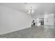 Bright dining area with tile floors and chandelier at 1135 E Westwood Dr, Casa Grande, AZ 85122