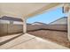 Covered patio with view of a gravel backyard at 1135 E Westwood Dr, Casa Grande, AZ 85122