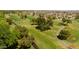 Aerial view of a lush green golf course at 12719 W Shadow Hills Dr, Sun City West, AZ 85375