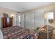 Serene bedroom with a king bed and a dresser at 12719 W Shadow Hills Dr, Sun City West, AZ 85375