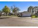 Landscaped yard and driveway of a single story home at 12719 W Shadow Hills Dr, Sun City West, AZ 85375