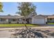 House exterior featuring a well-manicured lawn and driveway at 12719 W Shadow Hills Dr, Sun City West, AZ 85375